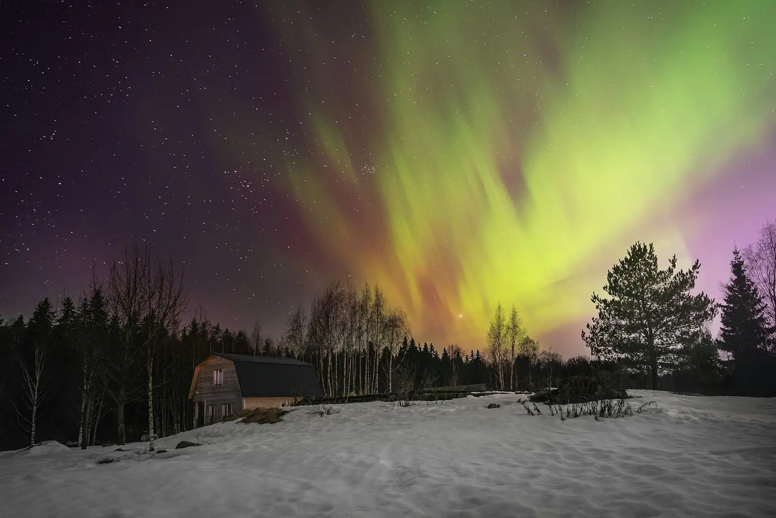 Rural North Dakota home in winter snow at night, the kind of place a standby generator keeps warm during a power outage